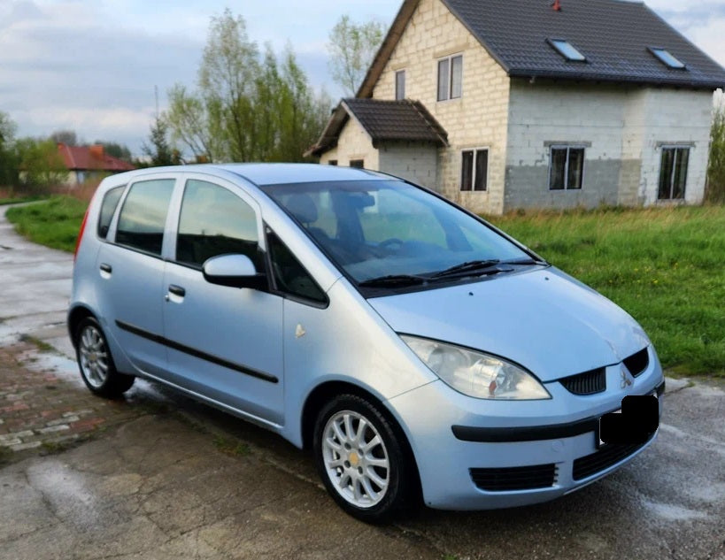 Mitsubishi Colt 1.3i 8631A372_060787_JM3607 IMMO OFF